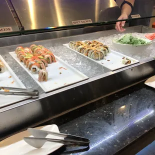 a variety of sushi and rolls