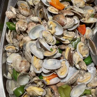 a platter of clams and peppers