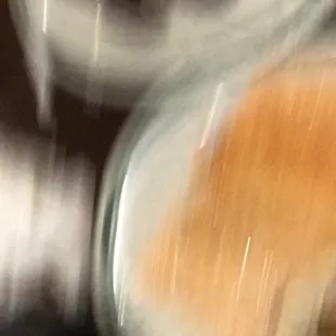 a blurry image of a donut being served