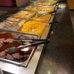 a buffet with a variety of food items