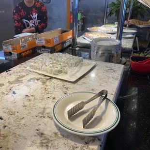 a woman preparing food in the kitchen