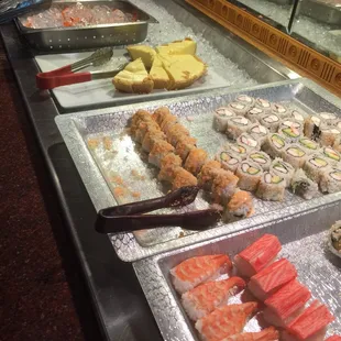 a variety of sushi on display