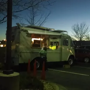 a food truck parked in a parking lot