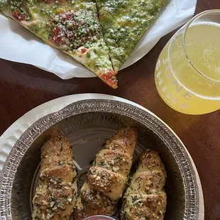 Pizza by the Slice - artichoke &amp; pesto  Garlic Rolls