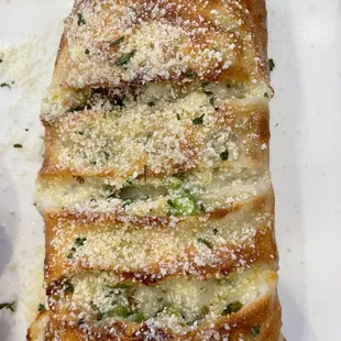 Stromboli with sausage, onion, and peppers