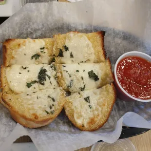 Cheesy Breadsticks with homemade marinara sauce.