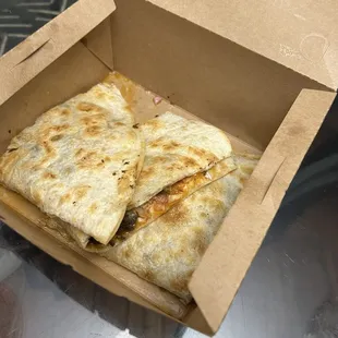 Overly greasy, sloppy, and COLD quesadilla.