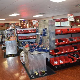 A retail store with large selection of towing and auto transport equipment.