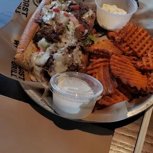 Philly cheese sreak and sweet potato waffle fries
