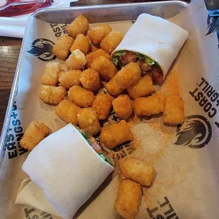Buffalo chicken wrap and tater tots