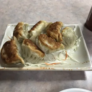 Fried dumplings.(comes with 8 but I sorda ate one before the picture ‍)