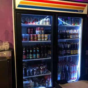 a display of beer and sodas