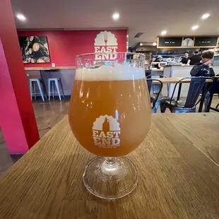 a glass of beer on a table