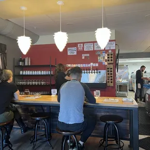 people sitting at the bar