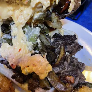 Italian pimento cheese steak. Ooey, gooey, and delicious!