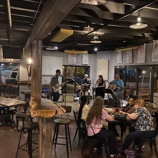 a group of people sitting at tables
