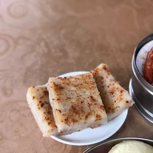 a plate of food and a bowl of soup