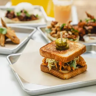 a grilled sandwich with pickles