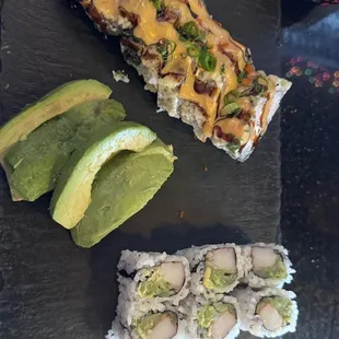 Kamikaze roll and California roll with side avocado