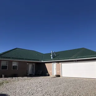 26 Ga Max Rib 40 Year Metal Roofing System with new seamless gutters and snowstop installed in Edgewood. Installed  in September 2018.