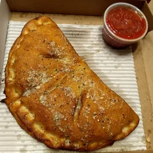 a slice of pizza in a box