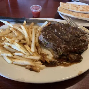 Hamburger Steak. Beware, onions and stuff inside the meat. Some surely like that but I didn't.