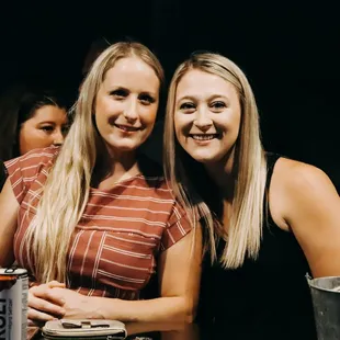 two women standing next to each other