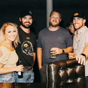 a group of friends posing for a picture