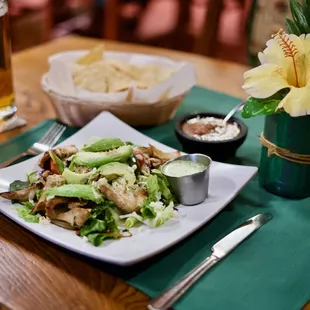 a plate of food and a glass of beer