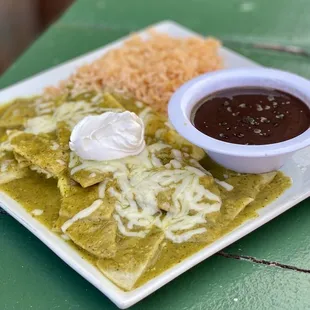 Chilquiles in salsa verde &amp; scrambled eggs, black beans