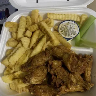 Lemon pepper wings and crinkle cut fries