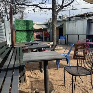 empty tables and chairs outside