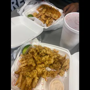 a tray of fried fish and fries