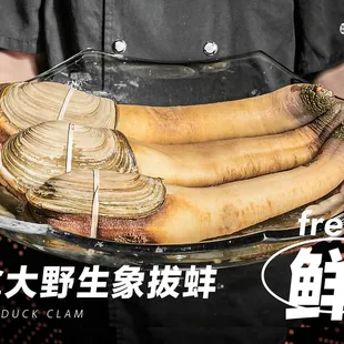 a chef holding a platter of food