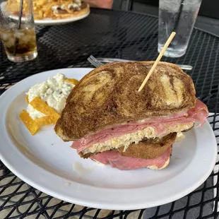 a sandwich on a white plate