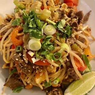 Spicy noodles with beef. Very good with the perfect balance of protein/veges to noodles. Beware, the peanut sauce is hot! (Spice level)