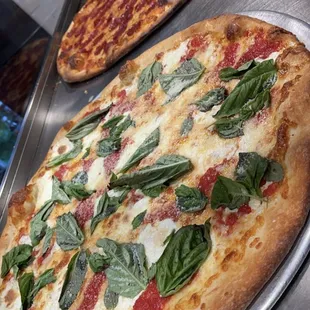 Margherita and pepperoni pizza..