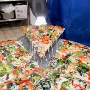 Vegetable pizza slices..
