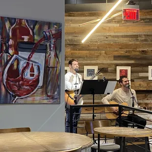 two musicians in a cafe