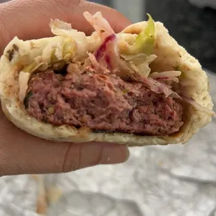 Raw meat that&apos;s hard as hell. Yet the Afshan deli cashier thinks this is okay? Sure, if you want mad cow disease. Wtf.