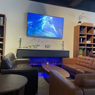 a living room with couches and a television