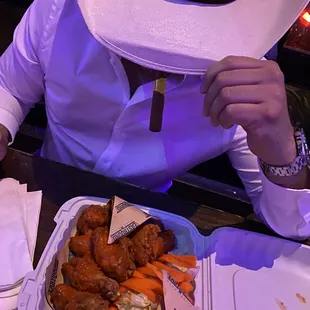 A cowboy and his Chicken wings