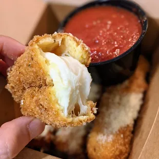 Housemade Mozz Sticks ($9) - hand-breaded housemade fresh mozzarella with choice of tomato or ranch dipping sauce.