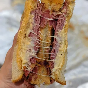 Kimchi Reuben ($10.75) - corned beef, Swiss, house kimchi, Russian, rustic sourdough.