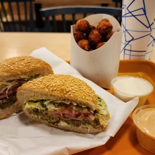 Falafel sandwich and sweet potato tots