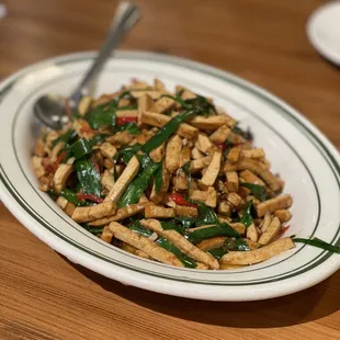 a plate of stir fried vegetables