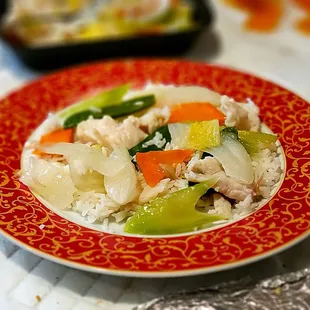 Chicken Chop Suey had tender moist white meat chicken. The sauce was bland. Tasted like water mixed with corn starch and a touch of sugar.