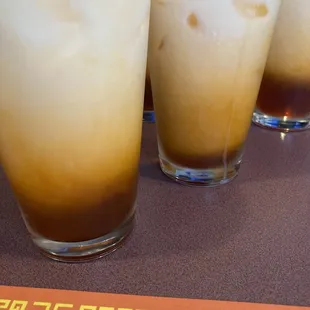 Thai iced tea and some edamame. I had the garlic beef and it was quite flavorful with a hint of spice to it .