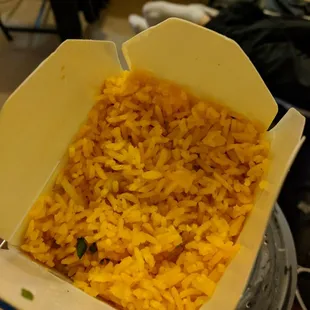Their version of &quot;fried rice&quot;. Which is yellow Mexican rice with onion.