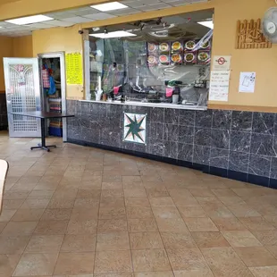 Social distancing and protective measures in place.